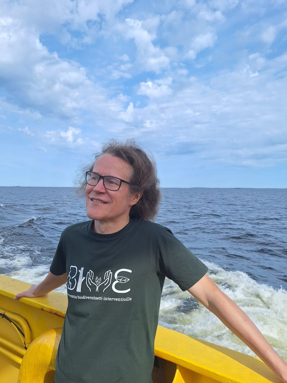 Photo of Aki Sinkkonen on a ferry. Photo of Aki Sinkkonen on a ferry.