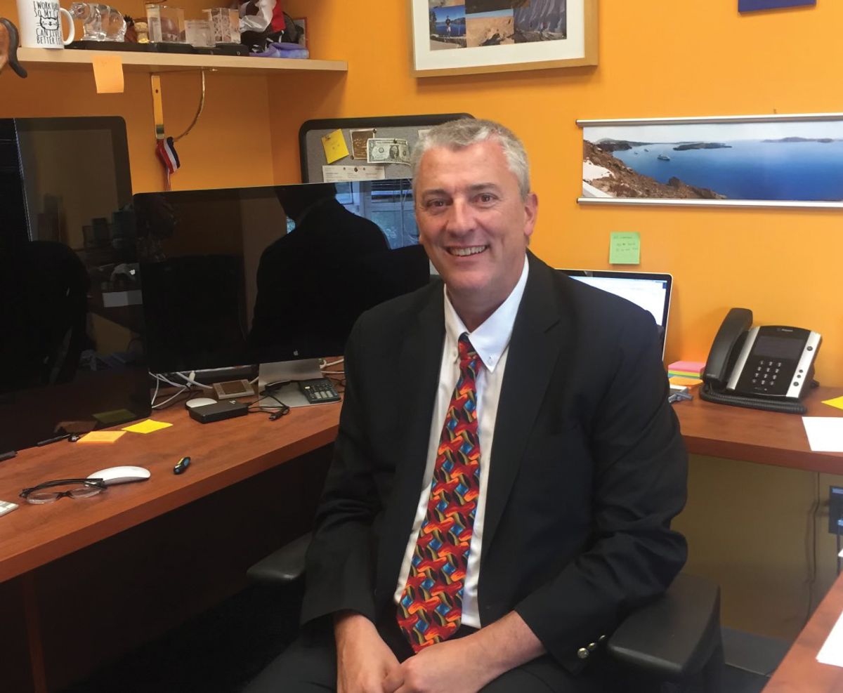 Mario Roederer, an immunologist at the National Institute of Allergy and Infectious Disease, sits at his computer desk in a black suit with a red and blue patterned tie. Mario Roederer, an immunologist at the National Institute of Allergy and Infectious Disease, sits at his computer desk in a black suit with a red and blue patterned tie.